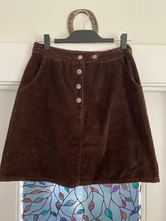 Adorable 90s brown corduroy skirt!! The corduroy is a nice thick material and it is a super flattering style. Perfect for winter with some tights and boots. I wish it fit me! Marked size: 8 Waist: 14" Length: 19" Corduroy Mini Skirt Pattern, Brown Corduroy Mini Skirt For Fall, Vintage Corduroy Skirt For Fall, Brown Corduroy Mini Skirt, Corduroy Skirt Outfit Fall, 80s Aesthetic Outfits, Cosy Clothes, 80's Clothes, Cosy Outfits