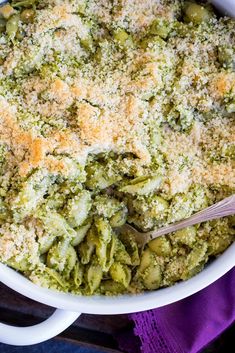 a casserole dish with broccoli and cheese