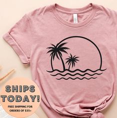 You've now found the staple t-shirt of your wardrobe. It's made of very soft cotton. And the double stitching on the neckline and sleeves add more durability to what is sure to be a favorite! Handmade item * 100% ringspun cotton * 4.5 oz/y² (153 g/m²) * Pre-shrunk * Shoulder-to-shoulder taping * Quarter-turned to avoid crease down the center. We use the latest in Direct to garment printing (DTG) technology to ensure high quality products. Cheap Tropical Cotton T-shirt, Cheap Vacation Shirt With Palm Tree Print, Summer Cotton T-shirt With Palm Tree Print, Cotton Tops With Palm Tree Print For Vacation, Pink Cotton Top With Palm Tree Print, Cotton Top With Palm Tree Print For Vacation, Tropical Cotton T-shirt With Palm Tree Print, Vacation Crew Neck Top With Palm Tree Print, Palm Tree Print Crew Neck Top For Vacation