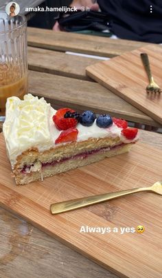 a piece of cake sitting on top of a wooden cutting board