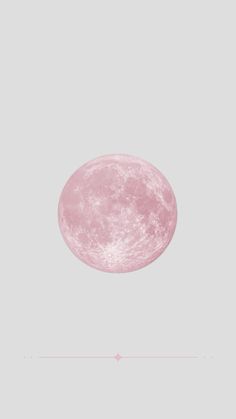 a pink moon is shown in the sky