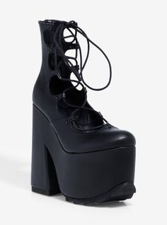 Dominate the scene in these YRU platform heels! They have wide lace-up detail in the front  and an exaggerated sole. There's a zipper up the back for ease.Listed in women's sizes.Platform: 3 14"; heel: 6 12"Polyurethane upper; rubber soleImported Cool Clothes For Girls, Perky Goth, Hot Topic Shoes, Cool Clothes, Cool Girl Outfits, Clothes For Girls, Prom Heels, Platform Stilettos, Prom Shoes