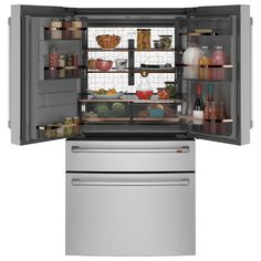 an open refrigerator with its door wide open and food in the bottom drawer is shown