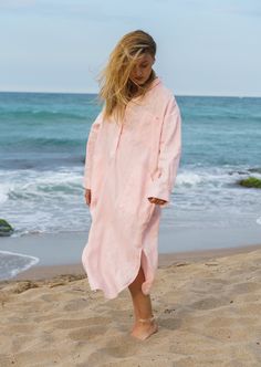 The Powder pink linen dress women is our favorite weekender. this Plus size maxi dress featuring an oversized relaxed fit with a front button closing. The womens long sleeve shirt dress is made from 100% linen, that is versatile for any occasion! This linen clothing is designed to be comfortable and not troublesome to wear.  After wearing this sustainable clothing for women, you will love it even more. This Oversized shirt dress is designed to flatter every body type and fit numerous occasions. Pink Relaxed Fit Midi Dress For Summer, Summer Linen Maxi Dress With Long Sleeves, Long Sleeve Linen Dress With Pockets For Beach, Long Sleeve Linen Midi Dress For Vacation, Oversized Linen Tunic Dress For Beach, Spring Linen Beach Dress With Pockets, Casual Pink Linen Dress For Vacation, Oversized Beach Dresses With Pockets, Beach Linen Dress With Pockets