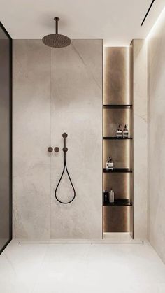 a bathroom with a walk in shower next to a shelf