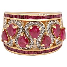 Fabricated in 18 karat yellow gold, this vintage beauty features seven alternating paisleys of bright red pear shaped rubies outlined by a sinuous framing of diamond pave. Smartly finished within a framing of square cut rubies. The pear shaped rubies weigh approximately 2.80 carats in total, the diamond pavé has a total carat weight of approximately 0.80 carats. and the square cut rubies weighing approximately 0.50 carats in total. Current ring size is 7.5. The ring can be slightly resized. Gold And Ruby Ring, Gold Ring Vintage, Red Pear, Ruby And Diamond Ring, Beauty Features, Ruby Diamond Rings, Semi Precious Jewelry, Retro Jewelry, Jewelry Tree