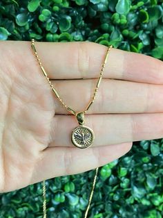 "18 Karat Gold Filled Holy Spirit Charm Necklace The perfect addition to layering with other 14\" or 16\" inch dainty gold chains. An elegant, simple piece that transitions well for daily wear. Material: 18 Karat Gold Filled Pendant Size: 12mm x 14mm Chain Length: 18 inches Material: 18 Karat Gold Filled, Hypoallergenic. Gold-filled does not de-laminate or peel like Gold plated Jewelry nor does it tarnish as readily as silver. Generally speaking, gold filled is better quality and will have a muc Gold Necklace With Box Chain For Her, Gold Box Chain Necklace As Gift For Her, Round Pendant Medallion Necklace On Box Chain As Gift, Gold Charm Necklaces With Box Chain, Box Chain Medallion Necklace As Gift, Medallion Box Chain Necklace As Gift, Gold Medallion Necklace With Lobster Clasp As Gift, Box Chain Medallion Necklace Gift, Gold Coin Necklace With Lobster Clasp As Gift