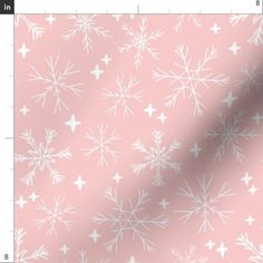 a pink background with white snowflakes in the middle and small stars on it