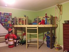 there is a bunk bed with a ladder in the middle and toys on the bottom