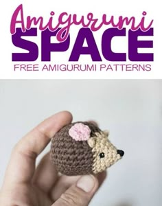 a hand holding a small crocheted animal in it's right hand with the text, amigurum space free amigurum patterns