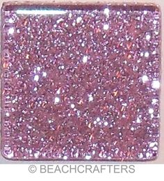 a square shaped purple glittered object on a white background with the words beachcrafters below it