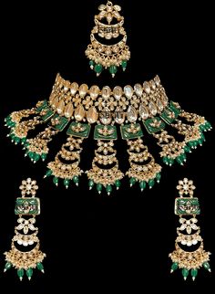 Tiana I - Indian Bridal Set w/ Emerald Drops, Kundan & Green Meenakari work Stunning modern choker necklace for Indian brides with Kundan stone setting. Fit for any fashionista who appreciates the beauty of fine craftsmanship and design all in one stunning set! Stunning green Meenakari work adorns this bridal set in square-shaped metal detail. This set is elaborated with moon design detailing of Kundan gems. This classic bridal jewelry is accented with mini green emerald stone drops at the ends. Green Kundan Bollywood Jewelry, Festive Green Kundan Jewelry, Heavy Green Kundan Jewelry, Green Kundan Jewelry With Meenakari, Green Kundan Jewelry For Diwali, Green Meenakari Kundan Jewelry, Festive Green Meenakari Jewelry, Green Kundan Chandbali Jewelry, Traditional Green Meenakari Jewelry