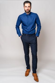 Look effortlessly smart for all every occasion in this blue Carter shirt. This wardrobe staple is cut to a classic fit with long sleeves and spread collar. Keep it formal by wearing alongside your three piece suit, or make it casual by rolling up the sleeves and paring with chinos or jeans. Model wears size M shirt and the Max navy trousers. Features Classic fit Spread collar Single cuff Long sleeve Plain fabric Cufflink holes Style Tip | ﻿Wear with a style that has navy detailing like the Scott Blue Slim Fit Shirt For Office, Blue Long Sleeve Dress Shirt For Office, Blue Slim Fit Dress Shirt For Office, Blue Slim Fit Dress Shirt For Work, Office Shirt With Welt Pockets And Lapel Collar, Blue Slim Fit Dress Shirt, Formal Blue Dress Shirt With Long Sleeves, Business Casual Shirt With Lapel Collar And Welt Pockets, Blue Long Sleeve Dress Shirt For Business Casual