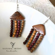 Introducing our Large Wood Earrings - Handcrafted with love and attention to detail, these dangle earrings are the perfect embodiment of eco-friendly fashion and style. 1. **Unique and Statement-Making Our Large Wood Earrings are designed to catch the eye and spark conversations. Their oversized dangle design makes them an ideal choice for those who love to stand out and express their individuality. 2. **Handmade with Care Each pair of these earrings is lovingly handcrafted, ensuring that every Earthy Dangle Earrings With Ear Wire, Nature-inspired Beaded Dangle Earrings As Gift, Earthy Beaded Dangle Earrings As Gift, Nature-inspired Dangle Beaded Earrings As Gift, Nature-inspired Dangle Beaded Earrings For Gift, Nature-inspired Jewelry With Dangling Beads For Gifts, Nature-inspired Brown Earrings For Jewelry Making, Brown Dangle Earrings Nature-inspired, Nature-inspired Dangle Jewelry In Natural Color