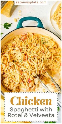 chicken spaghetti with rotini and velveeta in a pan