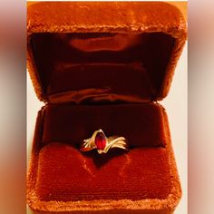 Beautiful 10k Genuine Ruby Ring In Solid 10k Yellow Gold, Vintage 1970s Size 8 Estate Ring - 3.02 Grams Total Weight! Estate Jewelry - In Great Condition, I Have Not Cleaned This Ring Or Box And A Few Minor Scratches That Could Be Cleaned And Polished, The Jewelry Presentation Box Show Some Age And Wear. See Photos. Metals & Stone Tested! Marked: 10k Aj Maker Mark Gold Rectangular Ruby Ring Gift, Rectangular Gold Ruby Ring For Gift, Red Rectangular 14k Gold Ring, Antique Red Ruby Ring In 14k Gold, 14k Gold Cabochon Red Ring, Estate Rings, Ruby Ring, Red Gold, Womens Jewelry Rings