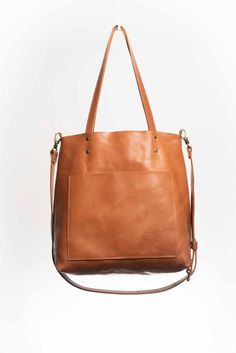 On-the-go Bucket Bag With Leather Handles, Leather Bag With Detachable Handle For Everyday, Leather Tote Weekender Bag For On-the-go, Everyday Weekender Bag With Top Handle And Adjustable Strap, Cognac Everyday Bag With Adjustable Strap, Everyday Cognac Bag With Adjustable Strap, Classic Tote Bucket Bag With Adjustable Strap, Classic Bucket Bag Tote With Adjustable Strap, Leather Shoulder Bag With Handle Drop For Everyday Use