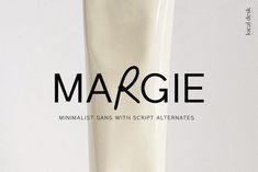 a tall white vase with the word margie written on it's front side