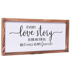 a wooden framed sign that says every love story is beautiful but ours is my favorite