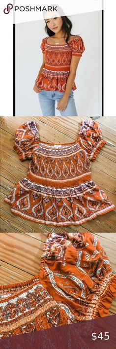 NWT Shop Zoco Smocked Top This smocked top has a peplum fit and fun sleeves. Burnt orange color. New with tags. Size large with lots of stretch to it due to the smock. Such a fun top. Tops Fun Sleeves, Burnt Orange Color, Smock Top, Smocked Top, Nice Tops, Burnt Orange, Orange Color, Smocking, Womens Sizes