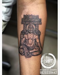 a man with a tattoo on his leg