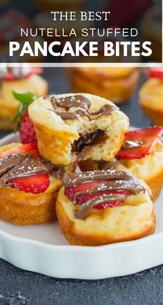 the best nutella stuffed pancake bites are on a white plate with strawberries