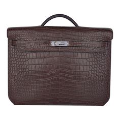 Mightychic offers an Hermes coveted Kelly Depeches 36 briefcase featured in Matte Havane Porosus Crocodile. Laptop compartment and a rear interior wall zip pocket. Accentuated with Palladium hardware. Refined and elegant, this timeless Hermes briefcase is an ultimate statement for an everyday business necessity. Comes with sleeper and signature Hermes box. NEW or NEVER WORN. final sale BRIEFCASE MEASURES: LENGTH 36.6 cm / 14.4" TALL 29 cm / 11.41" DEEP 5 cm / 1.97" CONDITION: NEW or NEVER WORN Luxury Formal Bags With Bill Compartment, Luxury High-end Briefcase With Removable Pouch, Luxury Formal Briefcase With Silver-tone Hardware, Luxury Textured Leather Briefcase, High-end Brown Briefcase, Luxury Brown Formal Cases, High-end Brown Rectangular Briefcase, Luxury Brown Briefcase For Formal Occasions, Luxury Textured Leather Briefcase For Business Trips