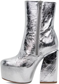 Ankle-high grained leather boots in metallic silver-tone. · Zip closure at inner side · Leather lining · Covered platform midsole · Covered block heel with rubber injection · Leather sole · Platform: H2.25 in · Heel: H5 in Supplier color: Silver Silver Platform Boots, Silver Platforms, Metallic Boots, Silver Boots, Fabulous Shoes, Dries Van Noten, Platform Boots, Leather Ankle Boots, Luxury Streetwear