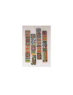 four pieces of colorful beaded bracelets on a white background