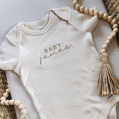 Embroidered Onesies® Brand Personalized Baby Girl Onesies® - Etsy Onsie Embroidery Ideas, Cotton Onesie For Baptism, Spring Baptism Cotton Onesie, Cream Short Sleeve Cotton Onesie, Cream Cotton Short Sleeve Onesie, Cotton Baptism Onesie With Short Sleeves, Cute Cotton Onesie For Baptism, Embroidered Baby Onesie, Baby Onesie Embroidery