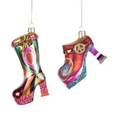 Add a touch of whimsy and luxury to your holiday décor with our 5.5" Glass Rainbow Platform Boot/Shoe Ornaments. The vibrant colors and intricate platform design evoke an air of exclusivity and creativity, making them the perfect addition to any fashion-forward or art-inspired holiday display. Set of 2 included for an extra touch of elegance. Boot Ornament, Shoe Ornaments, Platform Design, Boot Shoe, Hanging Christmas Tree, Holiday Display, Purple Christmas, Fairy Figurines, Christmas Dolls