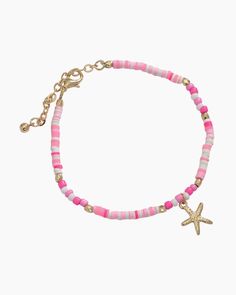 Multicolor pink beaded bracelet with gold starfish charmAdjustable design for the perfect fitLobster claw claspA stylish addition to any fashion jewelry collectionLead and nickel compliant Pink Starfish Jewelry For Gift, Pink Starfish Charm Jewelry, Star-shaped Colorful Beaded Jewelry For The Beach, Star-shaped Colorful Beads Jewelry For Beach, Summer Bracelet With Starfish Charm, Casual Beaded Bracelets With Starfish Charm, Casual Coral Jewelry For The Beach, Casual Coral Jewelry For Beach, Adjustable Starfish Bracelet With Lobster Clasp