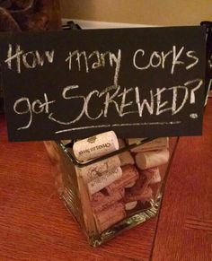 a sign that says how many corks do i screwed? on a table