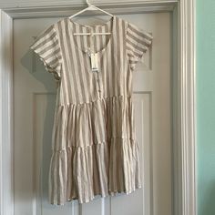 Nwt Rylee + Cru Size Xs Tan And Cream Striped Dress Casual Cream Flowy Dress, Casual Flowy Cream Dress, Casual Cream Mini Dress, Casual Neutral Summer Dress, Neutral Cotton Short Sleeve Dress, Casual Cream Mini Dress With Flowy Fit, Casual Cream Short Sleeve Dress, Beige Relaxed Fit Dress For Brunch, Beige Relaxed Fit Dress For Day Out