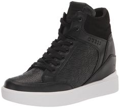 PRICES MAY VARY. The Guess Blairin lace up wedge sneaker is a great transitional style. It features a hidden wedge, padded collar, logo lacekeeper, and mudguard detail. Closed Toe Lace-Up Closure Imported Guess Sneakers, All Nike Shoes, Knee High Heels, Trainers Fashion, Lace Up Wedges, Athletic Fashion, Transitional Style, Black Logo, Fashion Sneakers