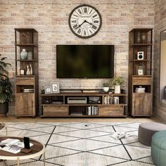 a living room with an entertainment center and large clock on the brick wall above it