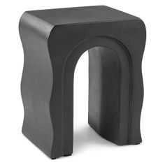 a black stool that is shaped like an arch