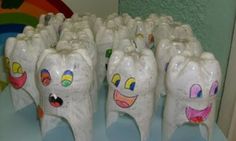 toothbrush holders with painted teeth on them