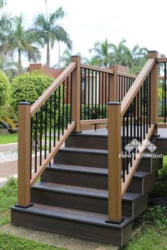 a set of wooden stairs with handrails