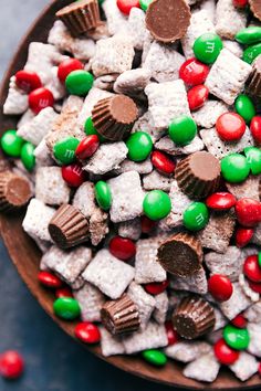 a bowl filled with candy and marshmallows