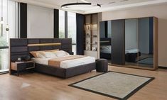 a bedroom with a large bed and sliding glass doors