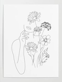 a black and white drawing of flowers on a white background with the outline of a woman's face