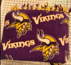 the minnesota vikings blanket has been made into a pillow