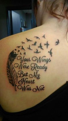 a woman's back with a tattoo saying your wings were ready but my heart was not