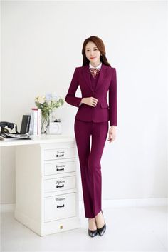 Looking for a trendy formal blazer & pants set that shows your fashion side? Then, find the better solution with this women's 4pieces suit set that includes a blazer, vest, blouse and pants. You will like the formal-style superb design. Made of polyester in a solid pattern, it is great workwear for business events and formal occasions.

Specifications
Gender: WOMEN
Item Type: Pant Suits
Model Number: 668
Closure Type: Single Breasted
Style: Office Lady
Sleeve Length(cm): Full
Material: Polyester Formal Uniform, Blazer Pants Set, Blouse And Pants, Formal Blazer, Single Breasted Blazer, Vest Blouse, Blazer Set, Uniform Design, Women Formals