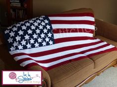 an american flag crocheted blanket on a couch