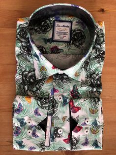 100% Cotton,offers you truly comfortable feelings  Made in Turkey with Best Craftmanship High-end print process,the trendy vibrant color,do not shrink,do not fade. Mens Luxury Design Button Down Dress Shirt, Long Sleeve, Casual Life, Floral Printing  it's a good choice for all year around. floral printed long sleeve slim fit men's funky casual shirts. It's not only a ordinary casual shirts,can also be used to match suits, also become new stylish dress shirt. Suitable for Party, Concert, Dating, Prom etc. Machine Wash /Do not bleach M-    39-40 L-      41-42 XL-   43-44 XXL- 45-46 Trendy Green Floral Print Shirt, Spring Patterned Shirt With Graphic Print, Summer Cotton Shirt With Fashion Print, Summer Cotton Tops With Exclusive Print, Casual Shirt With Unique Spring Print, Casual White Shirt With Unique Print, Multicolor Casual Collar Shirt For Spring, Fitted Graphic Print Shirt For Spring, Spring Patterned Shirt With Unique Print