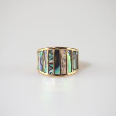 The take of unique abalone brings luster to this striped mother of pearl ring. A classic and modern piece made for everyday wear. This ring has a white version: Striped Mother of Pearl Ring 18k gold plated Stainless steel base Waterproof and tarnish free Available in US size 6-8 Ring sizing chart Gold Mother Of Pearl Rings For Anniversary, Gold Mother Of Pearl Anniversary Rings, Diy Wire Jewelry Rings, Abalone Ring, Dope Jewelry Accessories, Wire Jewelry Rings, Mother Of Pearl Ring, Mermaid Ring, Mother Of Pearl Jewelry