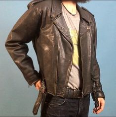 "Vintage 90's black leather motorcycle jacket designed by Polarpels, Norway Snap down collar, lapels and shoulder epaulets Traditional zippered sleeve cuffs Attached half belt with heavyweight nickel plated square buckle Three outside zippered pockets plus small functional coin flap pocket One interior pocket Fixed nylon insulated lining Jacket exterior is in great condition with minimal wear (one snap on left collar broken) Jacket interior is in great condition Labels are intact Name on label - Leather Biker Jacket For Alternative Fashion, Long Sleeve Biker Jacket With Belt Loops, Winter Biker Jacket With Belt Loops, Vintage Black Biker Jacket For Alternative Fashion, Biker Jacket With Belt Loops For Biker Events, Black Leather Motorcycle Jacket, Leather Motorcycle Jacket, Line Jackets, Jacket Design