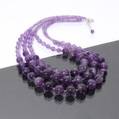 PRODUCT DETAIL :ITEM : PURPLE AMETHYST BEADED NECKLACEITEM CODE :  DGC3037ITEM NAME :NECKLACEGEMSTONE :  PURPLE AMETHYSTBEADS SHAPE : SMOOTH ROUNDLENGTH :   17"-19" INCH APPROXBEADS SIZE:  3mm/6-12 MM ApproxWEIGHT :  431 Cts. APPROXCUSTOMIZATION/BULK ORDER : AVAILABLEPLEASE FEEL FREE TO CONTACT IF YOU REQUIRE ANY FURTHER INFORMATION. Luxury Briolette Beaded Necklace With Polished Beads, Cheap Lavender Beaded Necklaces For Gifts, Luxury Oval Beads Beaded Necklace For Gift, Cheap Oval Gemstone Beads Necklaces, Purple Amethyst Bead Jewelry, Purple Faceted Round Beads, Purple Round Faceted Beads, Rondelle Amethyst Gemstone Beads, Amethyst Rondelle Gemstone Beads